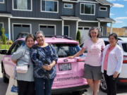 From left: Lucy Beltran, Esthela Cazarez, Susan Stearns and Margarita Jimenez Pacheco stand by the bright pink car sponsored by Vancouver Toyota for Pink Lemonade Project. The women met for the first time in August after participating in a Latina support group for Spanish speaking patients that met virtually during the pandemic.