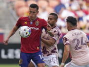 Portland Timbers defender Bill Tuiloma (25) defends against Real Salt Lake forward Rubio Rubin (14) during the first half of an MLS soccer match Sunday, Oct. 9, 2022, in Sandy, Utah.