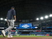 The Seattle Mariners take to the field  during a baseball workout, Thursday, Oct. 6, 2022, in Toronto, ahead of the team's wildcard playoff game against the Toronto Blue Jays.