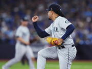 Seattle Mariners starting pitcher Luis Castillo reacts after striking out Toronto Blue Jays' Danny Jansen during the seventh inning of Game 1 of a baseball AL wild-card series, Friday, Oct. 7, 2022, in Toronto.