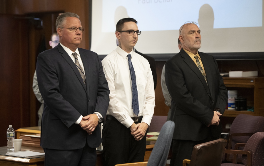 Paul Bellar, middle, appears before Jackson County Circuit Court Judge Thomas Wilson on Wednesday, Oct. 5, 2022 for trial in Jackson, Mich. Paul Bellar, Joseph Morrison and Pete Musico are charged in connection with a 2020 anti-government plot to kidnap Michigan Gov. Gretchen Whitmer. (J.