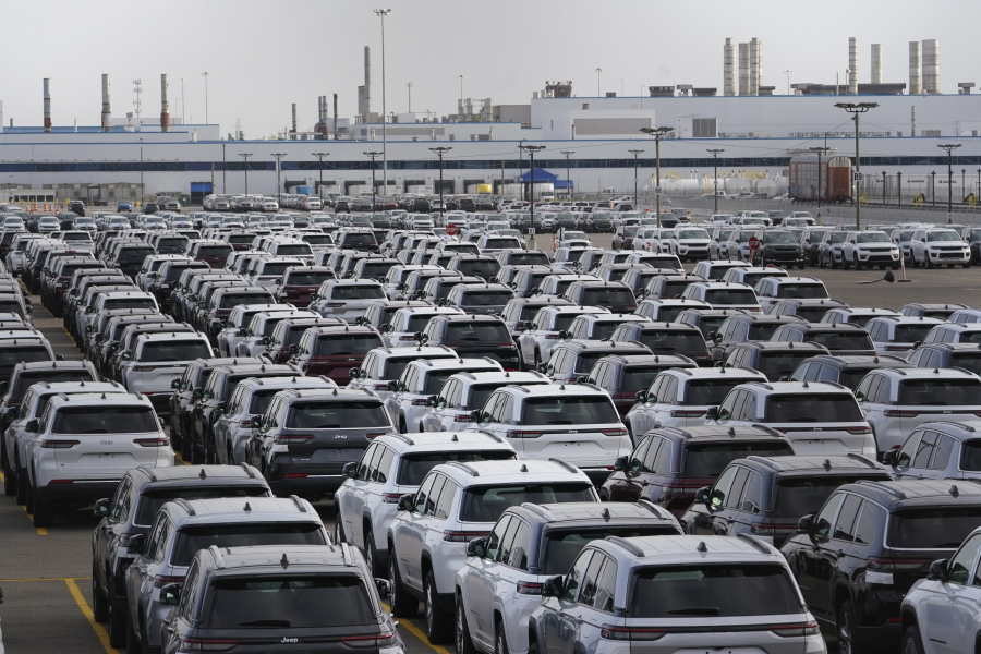New vehicles are shown parked in storage lots near the the Stellantis Detroit Assembly Complex in Detroit, Wednesday, Oct. 5, 2022. Over the past few years, thieves have driven new vehicles from automaker storage lots and dealerships across the Detroit area. In 2018, eight vehicles were driven from what then was Fiat Chrysler's Jefferson North plant.