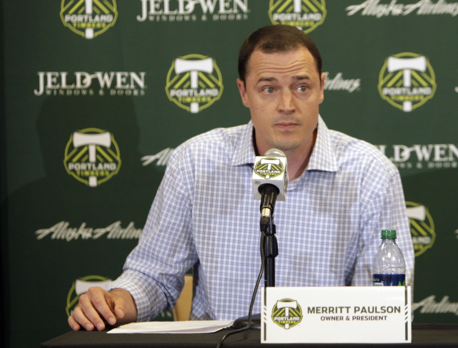 FILE - Portland Timbers president Merritt Paulson speaks during a soccer news conference announcing the firing of Timbers coach John Spencer on July 9, 2012, in Portland, Ore. Paulson, who also owns the Portland Thorns women soccer team, has removed himself from a decision-making role with the National Women's Soccer League club until the findings are released from an ongoing investigation into numerous scandals around the league.