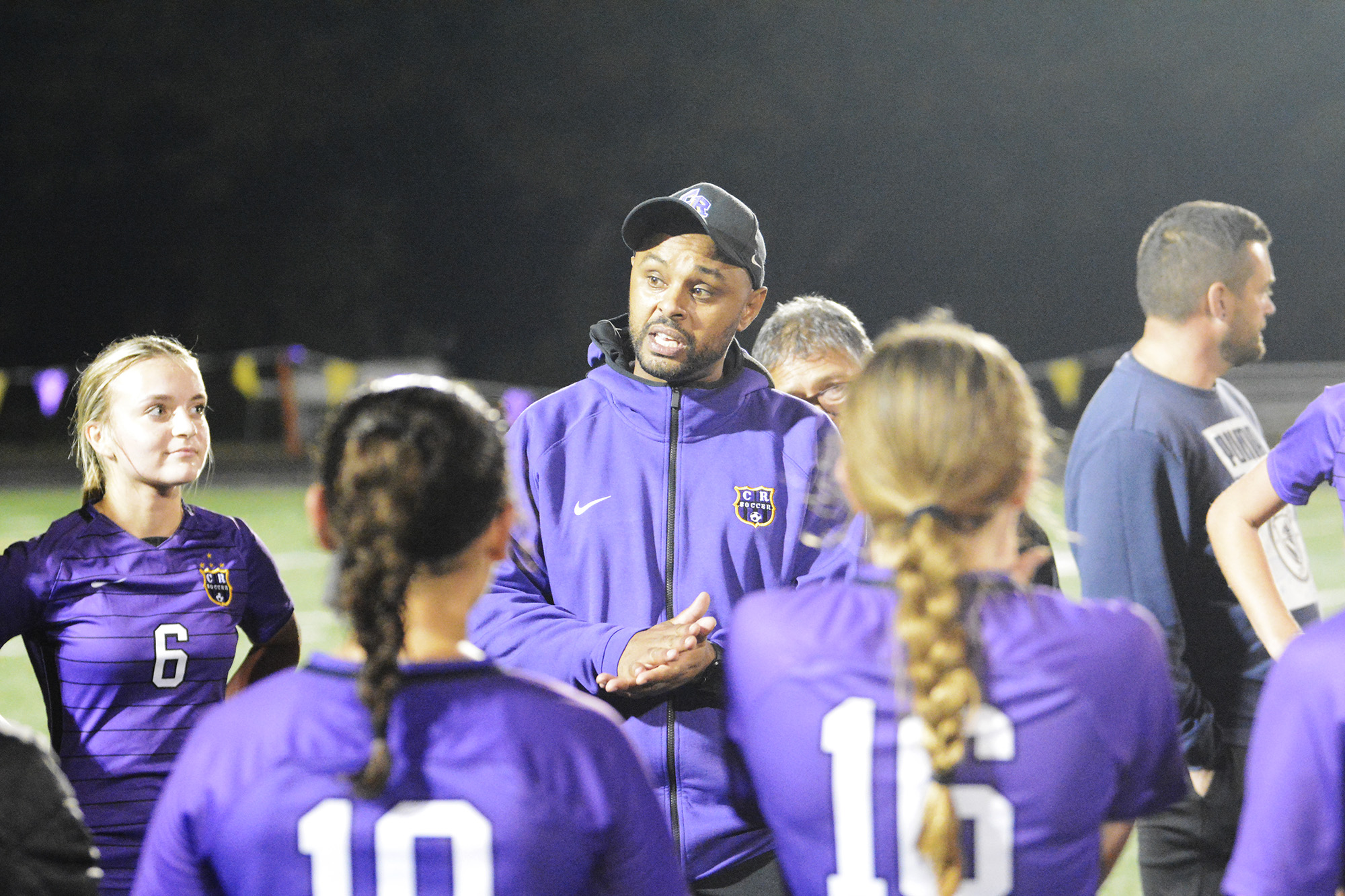 Columbia River coach Filly Afenegus addresses his team after the Rapids’ 2-1 win over Ridgefield on Tuesday, Oct. 4, 2022.