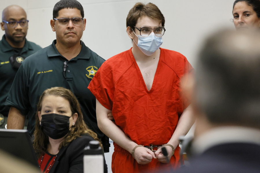 Marjory Stoneman Douglas High School shooter Nikolas Cruz is escorted into the courtroom for a hearing regarding possible jury misconduct during deliberations in the penalty phase of his trial, Friday, Oct. 14, 2022, at the Broward County Courthouse in Fort Lauderdale, Fla.