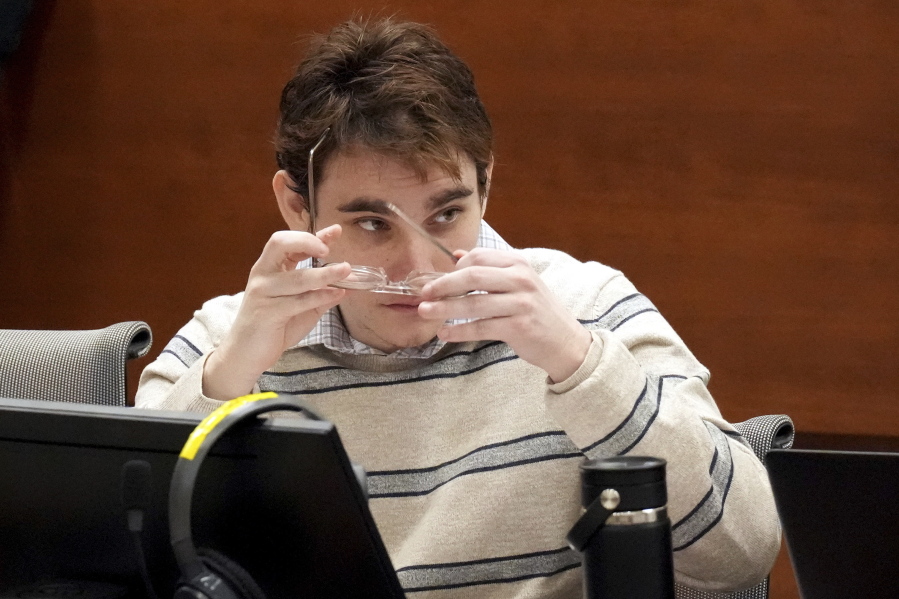 Marjory Stoneman Douglas High School shooter Nikolas Cruz sits at the defense table for closing arguments in the penalty phase of Cruz's trial at the Broward County Courthouse in Fort Lauderdale on Tuesday, Oct. 11, 2022. Cruz previously plead guilty to all 17 counts of premeditated murder and 17 counts of attempted murder in the 2018 shootings.