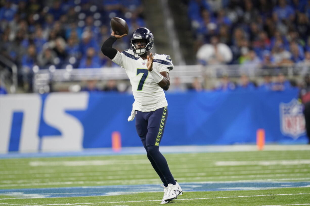 Seattle Seahawks quarterback Geno Smith passes during the first half of an NFL football game against the Detroit Lions, Sunday, Oct. 2, 2022, in Detroit.