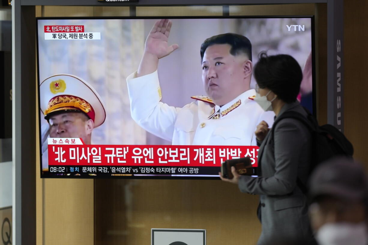 A TV screen showing a news program reporting about North Korea's missile launch with file footage of North Korean leader Kim Jong Un, is seen at the Seoul Railway Station in Seoul, South Korea, Thursday, Oct. 6, 2022. North Korea launched two ballistic missiles toward its eastern waters on Thursday, as the United States redeployed one of its aircraft carriers near the Korean Peninsula in response to the North's recent launch of a powerful missile over Japan.