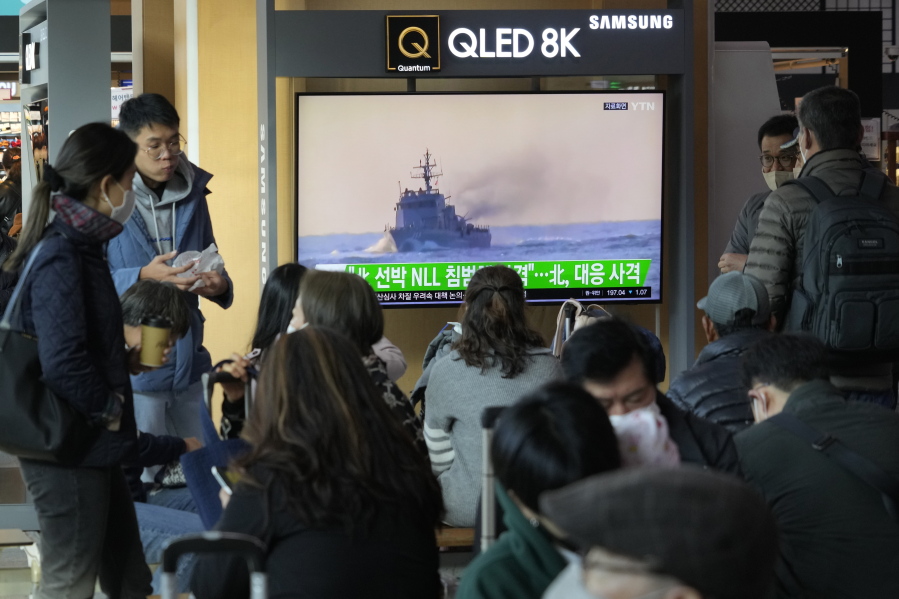 A TV screen shows a file image of a South Korean navy vessel during a news program at the Seoul Railway Station in Seoul, South Korea, Monday, Oct. 24, 2022. The rival Koreas exchanged warning shots along their disputed western sea boundary on Monday, their militaries said, amid heightened animosities over North Korea's recent barrage of weapons tests.