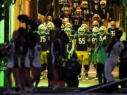 Notre Dame players ready to run onto the field before an NCAA college football game against Stanford in South Bend, Ind., Saturday, Oct. 15, 2022. (AP Photo/Nam Y.