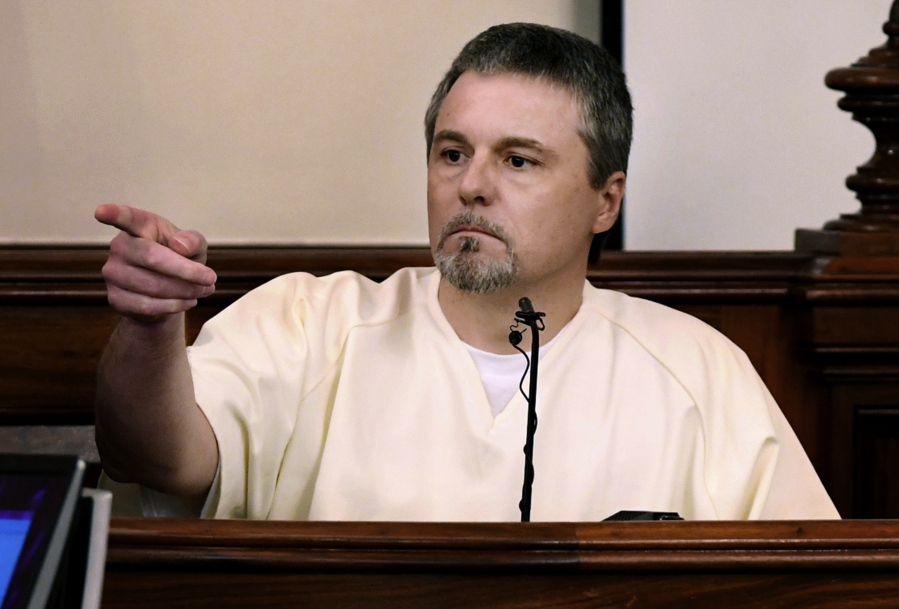 FILE - Jason Autry identifies Zachery Adams during his testimony on day four of Adams' murder trial on Sept. 14, 2017, in Savannah, Tenn. Autry, a convicted felon who was released from prison after giving key trial testimony about the slaying of Tennessee nursing student Holly Bobo, plans to change his plea to guilty on weapons charges filed shortly after he was granted his freedom, according to an Oct. 3, 2022, court filing obtained by The Associated Press.