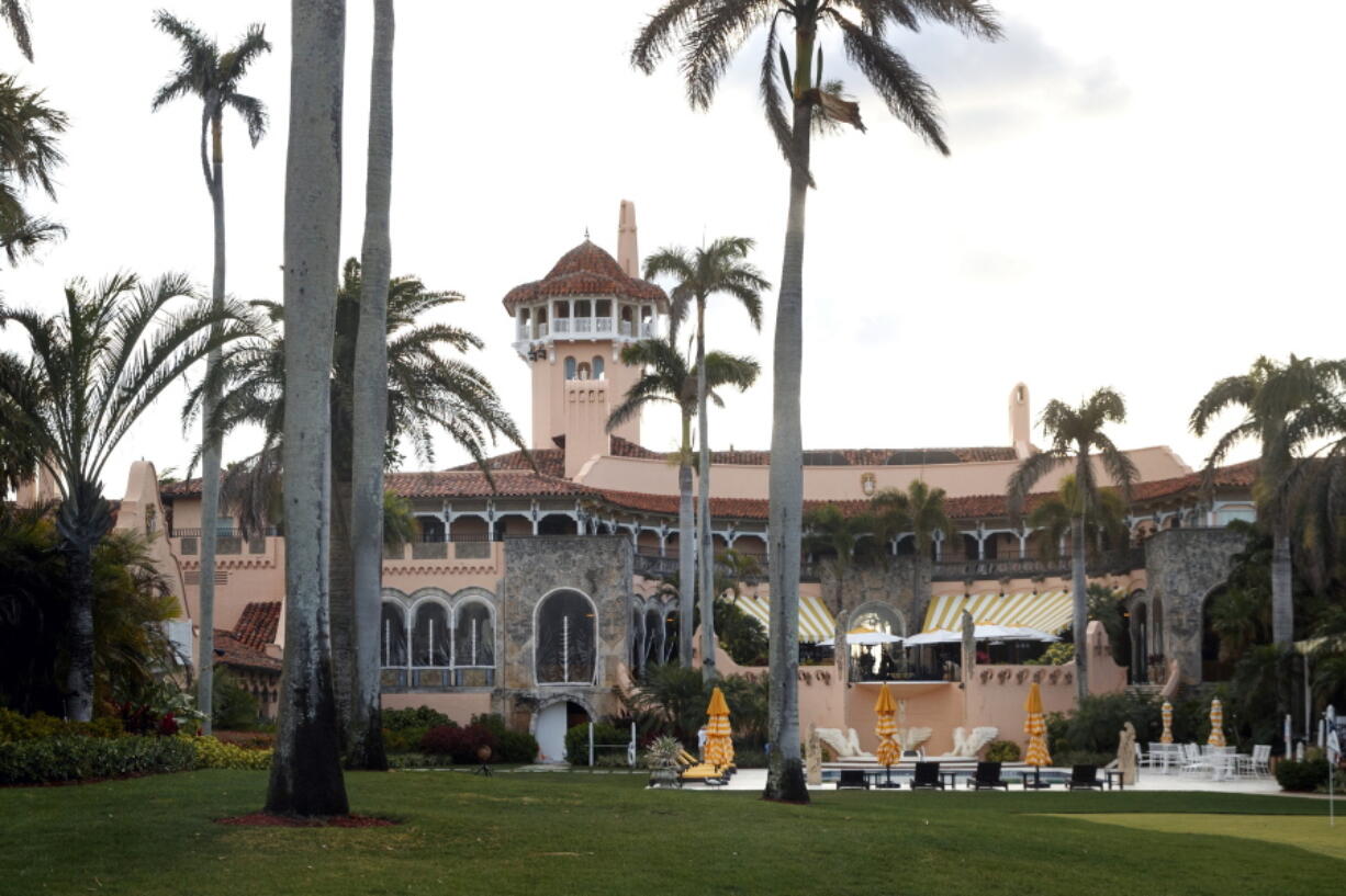 FILE - President Donald Trump's Mar-a-Lago estate is seen from the media van in the presidential motorcade in Palm Beach, Fla., March 24, 2018, en route to Trump International Golf Club in West Palm Beach, Fla. The FBI search of Donald Trump's Florida estate has spawned a parallel special master process that this month slowed down a criminal investigation and exposed simmering tensions between Justice Department prosecutors and lawyers for the former president. The probe into the presence of top-secret information at Mar-a-Lago continues.