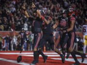 Utah quarterback Cameron Rising (7) celebrates a 2-point conversion against Southern California during an NCAA college football game Saturday, Oct. 15, 2022, in Salt Lake City.