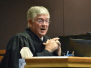 FILE - Montana District Judge Michael Moses speaks to attorneys during a court hearing on Sept 15, 2022, in Billings, Mont. The judge has struck down state laws that ended same-day voter registration, tightened student identification requirements for elections and restricted third-party ballot collections.