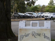 A vacant lot at West 11th Street and Daniels Street, a possible location for the third Safe Stay community, is seen from the front steps of Briar Rose Inn in downtown Vancouver.