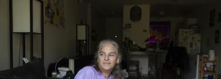 Saree Adams, a tenant at Rockwood Terrace in Washougal, sits in her two-bedroom apartment where she has lived for 10 years. The complex recently raised rents by nearly $400 for some residents, an increase of about 40 percent. Adams and many other residents say they cannot pay the new price.