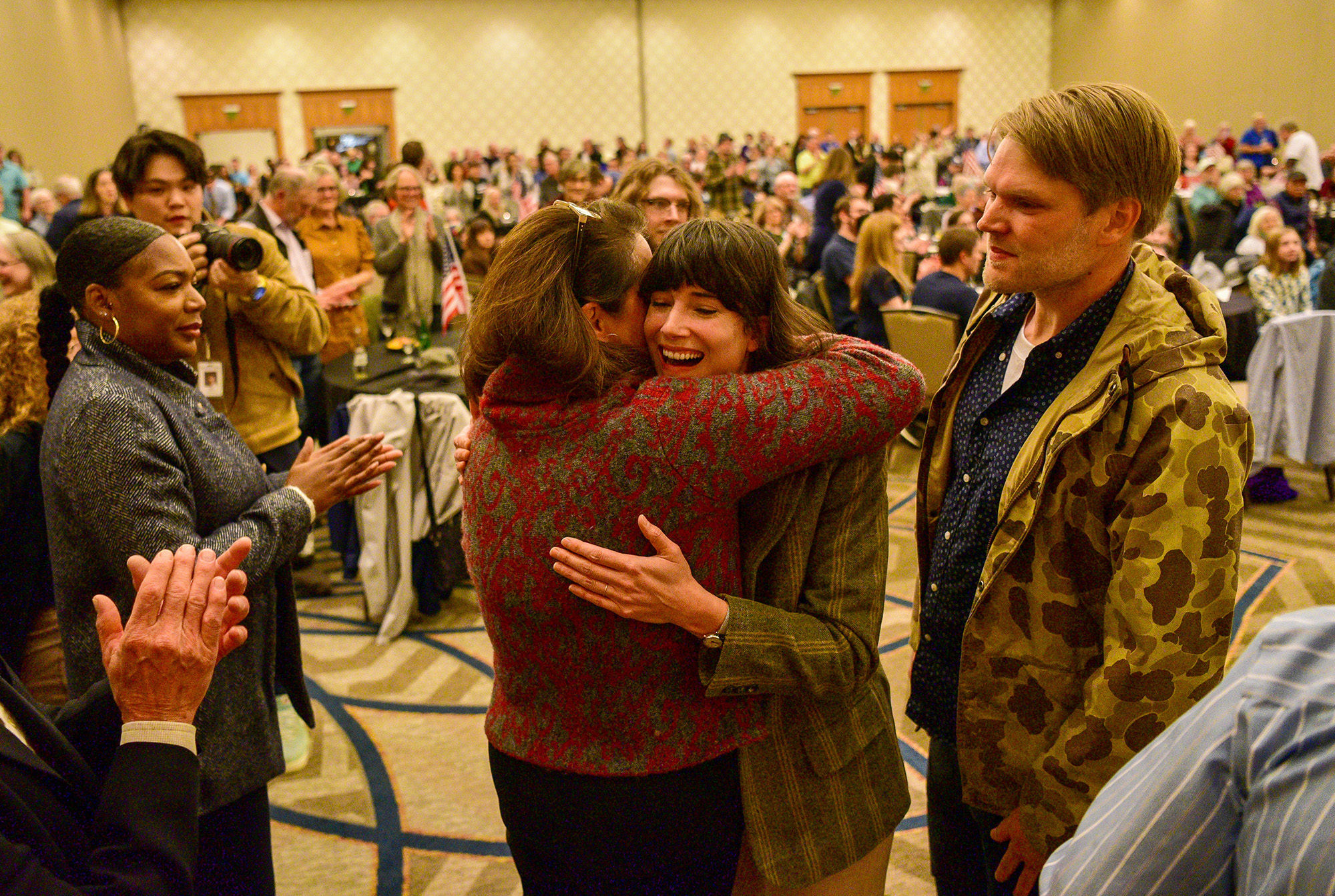 Democratic nominee for Washington’s Third District Marie Gluesenkamp Perez, center, hugs supporters after her speech Tuesday, Nov. 8, 2022, at the Clark County Democrats election night watch party at the Downtown Vancouver Hilton.
