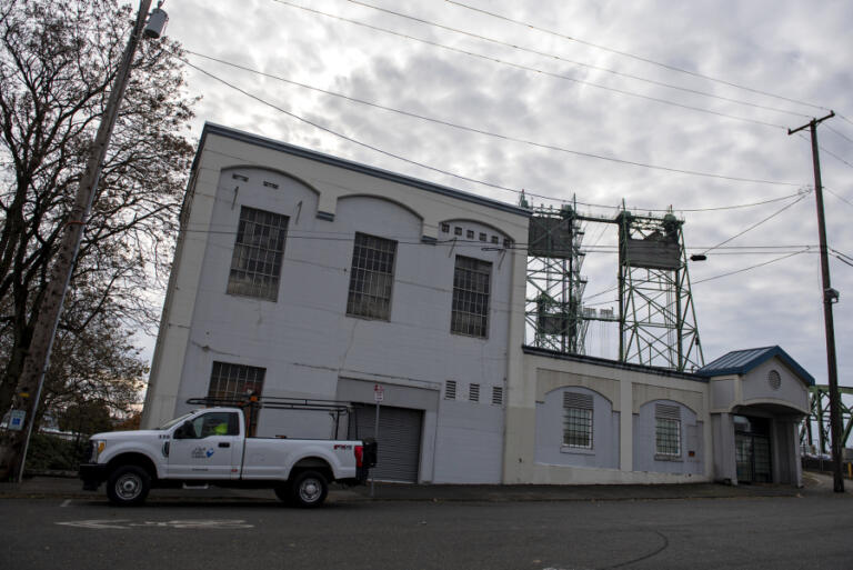 Clark Public Utilities' Bridge Substation once housed electrical switching gear in the tall portion of the building, which was moved to the site in 1913. An office wing, on the right, was added sometime later. Neither are in use today.