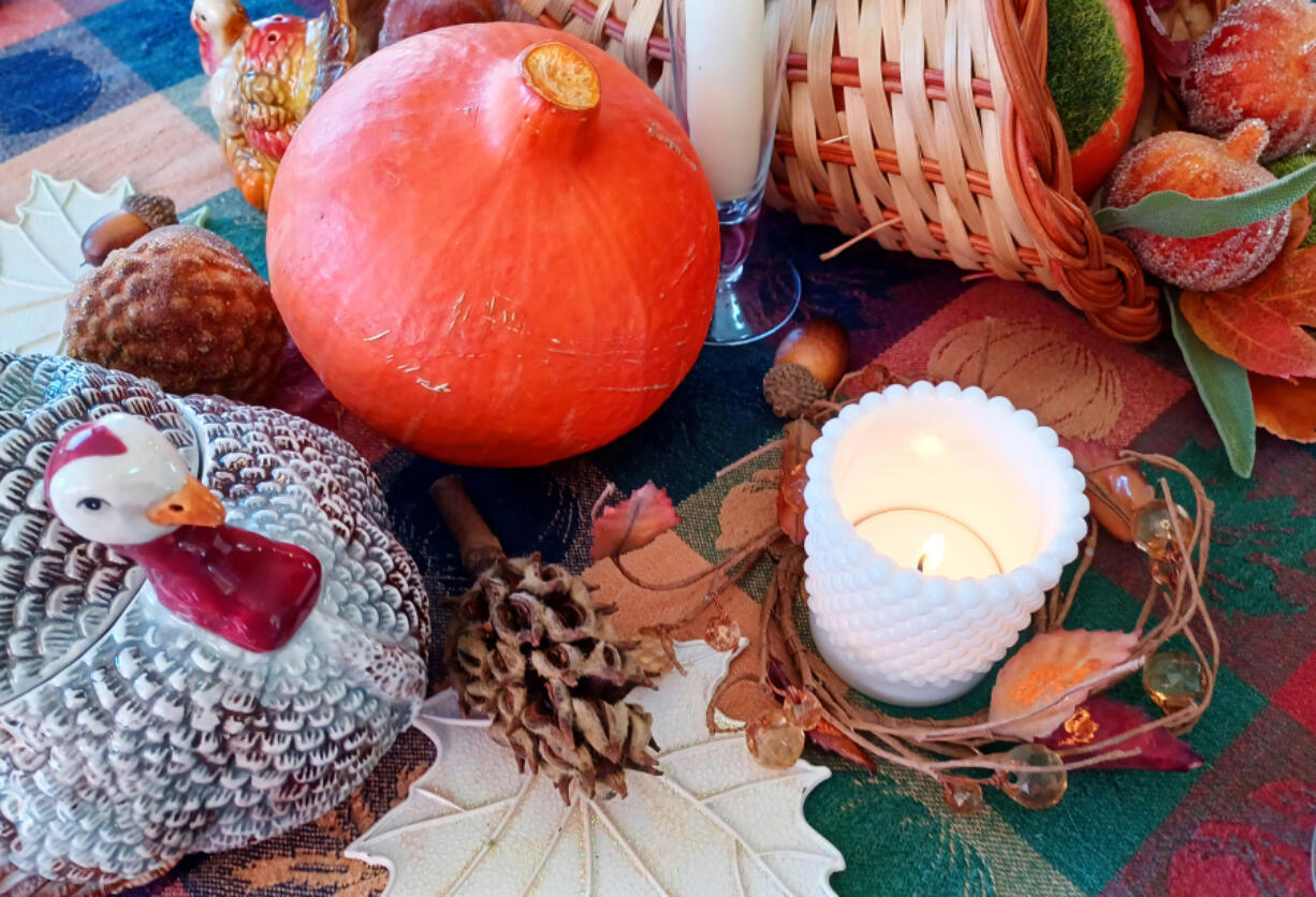 Bring in natural elements like dried leaves, real gourds, acorns and textural dried magnolia pods.