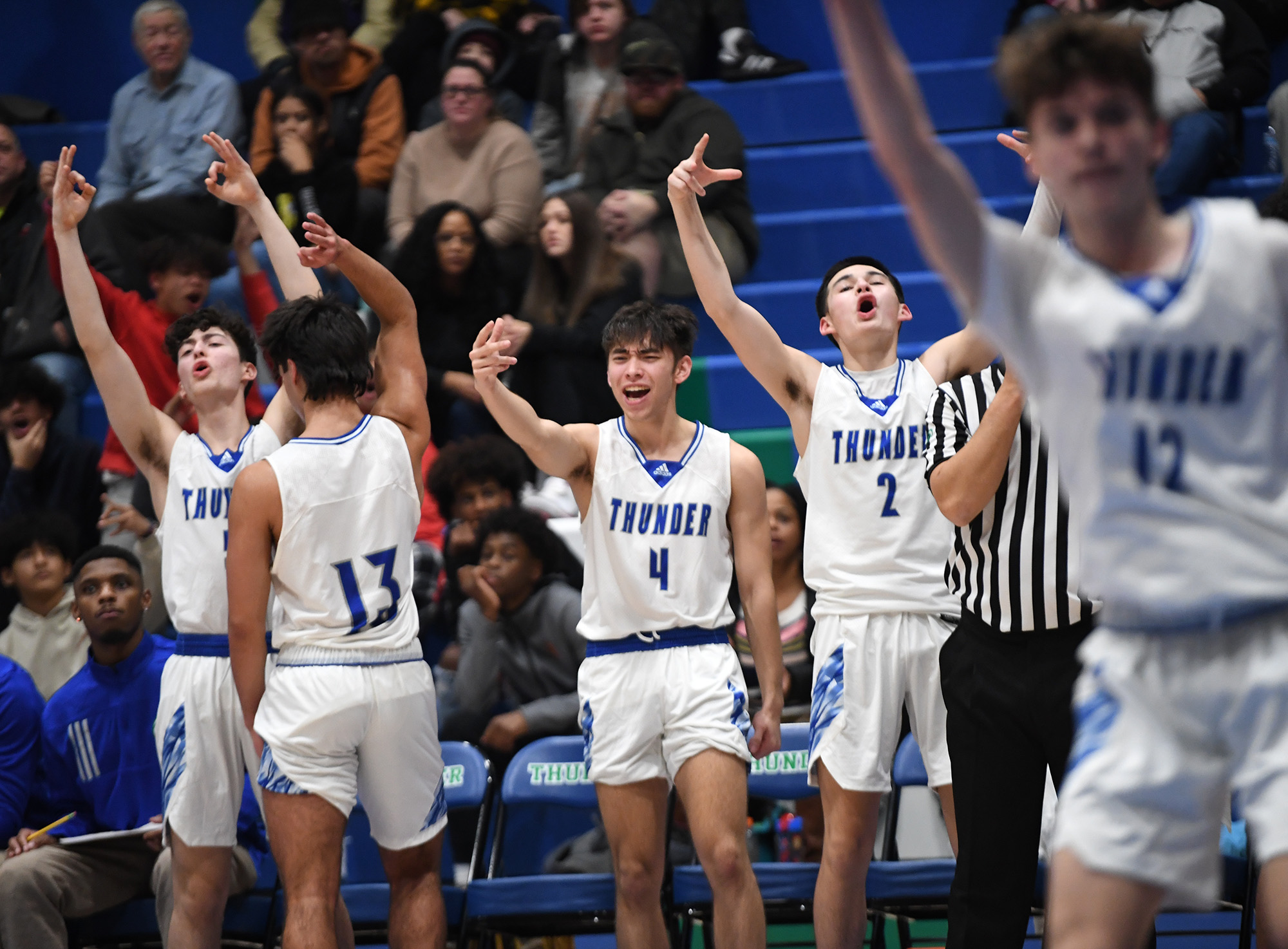 Mountain View players celebrate a basket Tuesday, Nov. 29, 2022, during the Thunder’s 74-60 win against Evergreen at Mountain View High School.