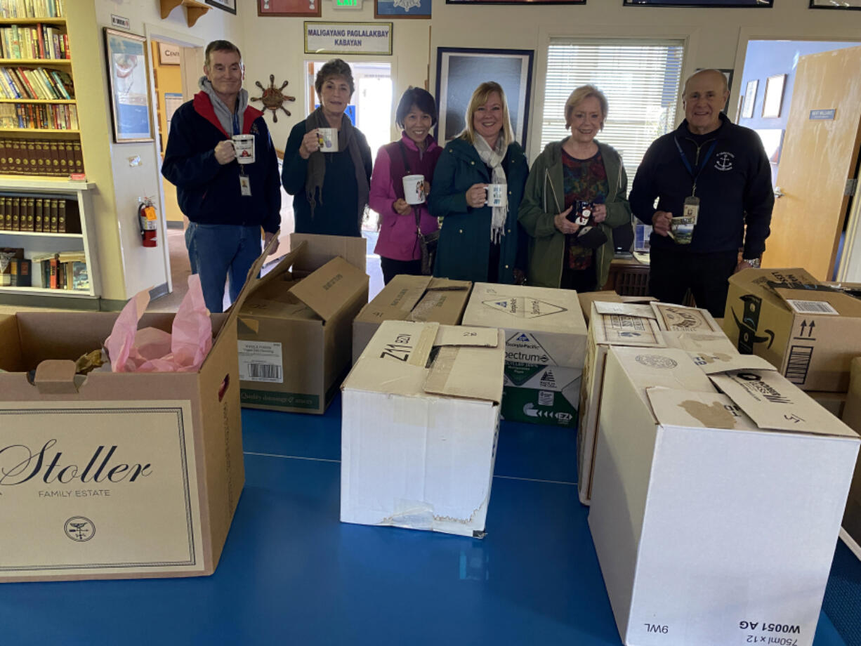 The Clark County Newcomers Club recently donated 246 coffee mugs to the Seafarer's Center at the Port of Vancouver.