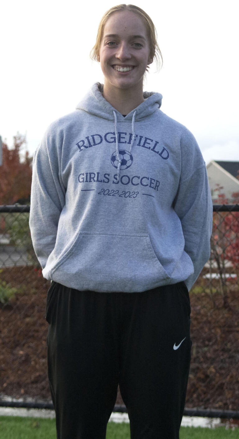 Ridgefield's Cameron Jones (13) has missed out on her senior season due to a knee injury, but her contributions from the sidelines have more than helped the Spudders this season as they open the state playoffs against East Valley on Wednesday, Nov. 9, 2022 at Yakima.