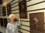 Vocalist Brenda Lee stands with her plaque at The Country Music Hall of Fame & Museum on June 11, 2016, in Nashville.
