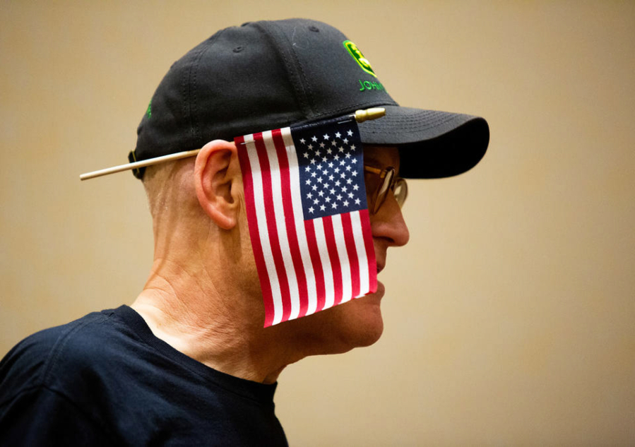 An attendee wears an American flag on his ear at the Washington State Republicans election night watch party Tuesday in Bellevue.