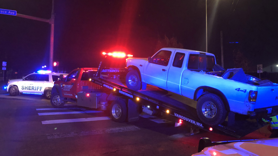 A pickup allegedly driven by Jason Tester, 22, of Vancouver is towed away after it was immobilized by Clark County sheriff's deputies. A sergeant attempted to pull Tester over for speeding, but he said Tester refused to stop.