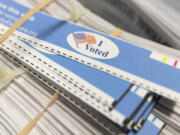 An American flag and the words "I voted" are pictured on ballot stubs on Election Day at the Pierce County Election Center in Tacoma, Wash. on Tuesday, Nov. 8, 2022.