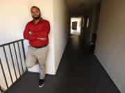 Robert Gardner, a Section 8 tenant denied numerous times by landlords who said they didn't take Section 8 clients, stands in the apartment building where he lives in Los Angeles on Oct. 18, 2022.