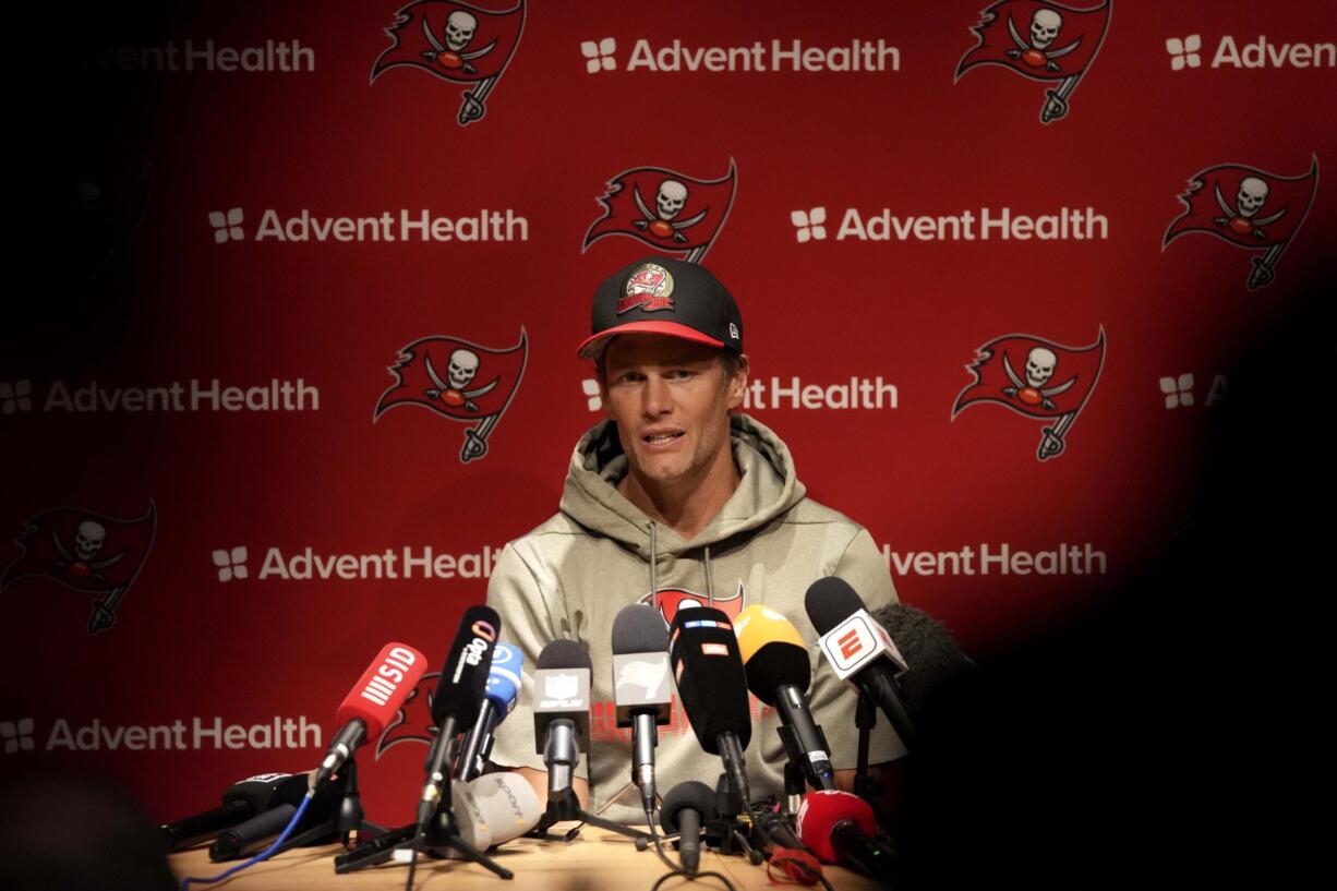 Tampa Bay Buccaneers quarterback Tom Brady attends a news conference after a practice session in Munich, Germany, Friday, Nov. 11, 2022. The Tampa Bay Buccaneers are set to play the Seattle Seahawks in an NFL game at the Allianz Arena in Munich on Sunday.