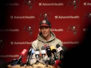 Tampa Bay Buccaneers quarterback Tom Brady attends a news conference after a practice session in Munich, Germany, Friday, Nov. 11, 2022. The Tampa Bay Buccaneers are set to play the Seattle Seahawks in an NFL game at the Allianz Arena in Munich on Sunday.