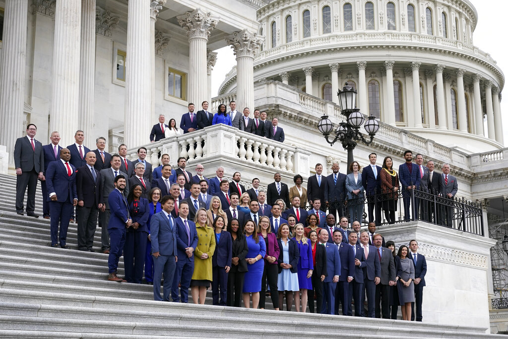 Newly-elected members of Congress pose for a class photo on the East Front of the Capitol in Washington, Tuesday, Nov. 15, 2022.