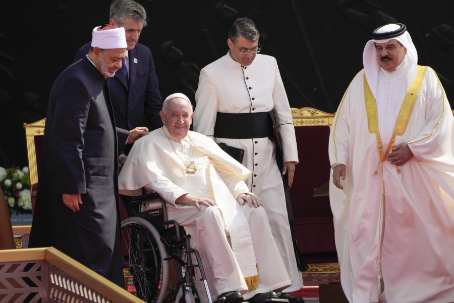 From left, Ahmed El-Tayeb, Grand Imam of al-Azhar, Pope Francis and Bahrain's King Hamad bin Isa Al Khalifa attend the closing session of the "Bahrain Forum for Dialogue: East and west for Human Coexistence", at the Al-Fida square at the Sakhir Royal palace, Bahrain, Friday, Nov. 4, 2022. Pope Francis is making the November 3-6 visit to participate in a government-sponsored conference on East-West dialogue and to minister to Bahrain's tiny Catholic community, part of his effort to pursue dialogue with the Muslim world.