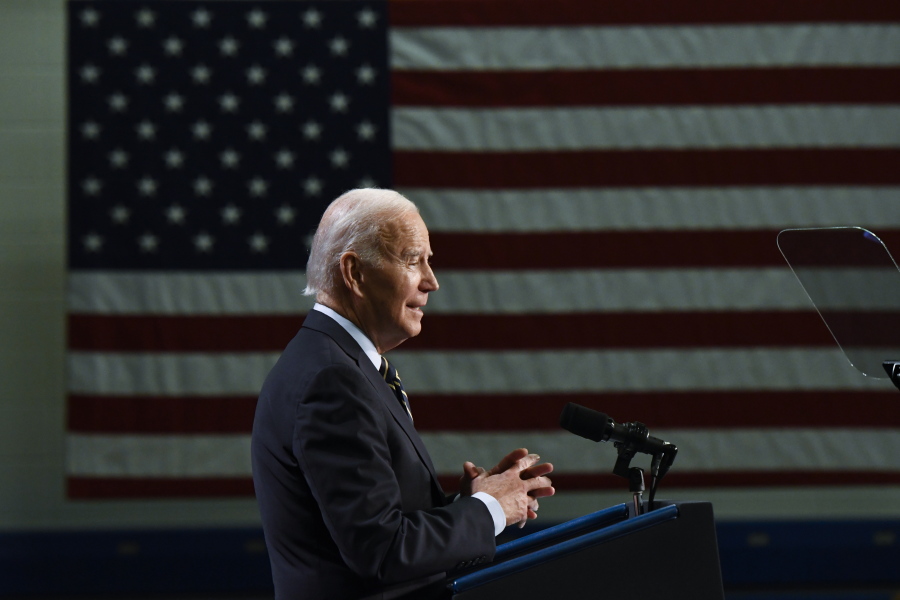 President Joe Biden speaks about his administration's plans to lower prescription drug costs and protect Social Security and Medicare, Saturday, Nov. 5, 2022, at Jones Elementary School in Joliet, Ill.
