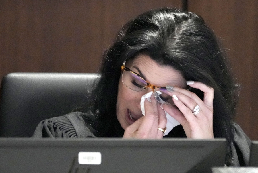 Waukesha County Circuit Court Judge Jennifer Dorow wipes away tears while talking about victim statements during her closing remarks before sentencing Darrell Brooks to 6 consecutive life sentences in a Waukesha County Circuit Court in Waukesha, Wis., on Wednesday, Nov. 16, 2022.
