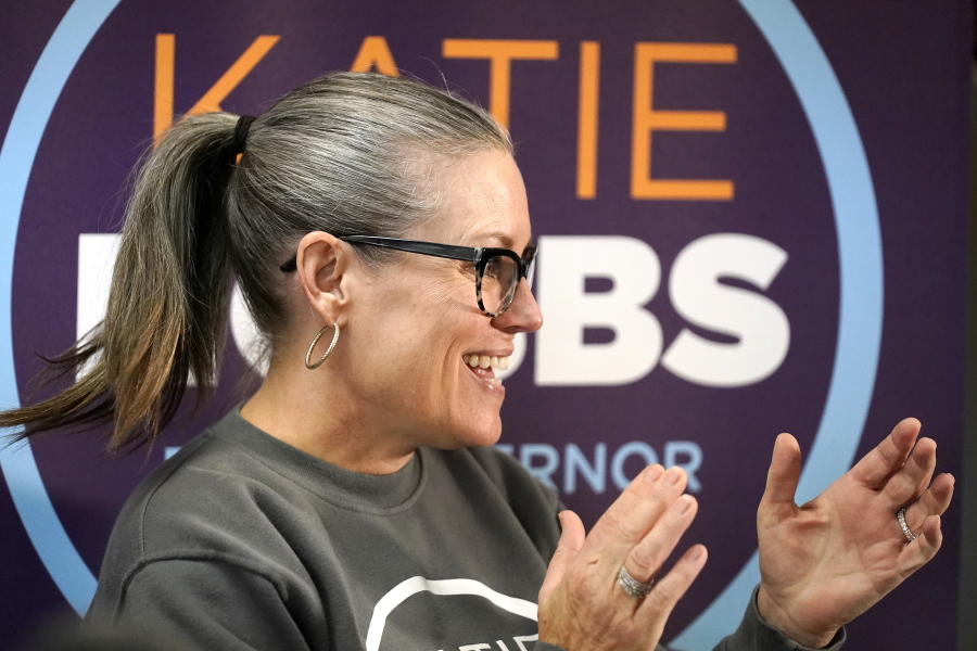 Katie Hobbs, Democratic candidate for Arizona governor, applauds supporters at a campaign event in Peoria, Ariz., Monday, Nov. 7, 2022. (AP Photo/Ross D.