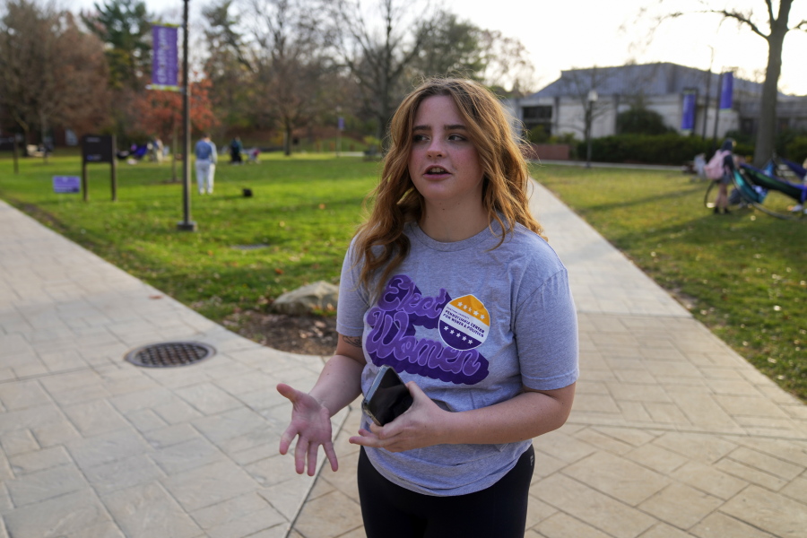 Brianna McCullough, 20, a sophomore at Chatham University in Pittsburgh, walks through campus on Thursday, Nov. 10, 2022. Support for abortion rights did drive women to the polls in Tuesday's elections. But for many, the issue took on higher meaning, part of an overarching concern about the future of democracy. "If they can take this away, they can take anything away from people. And I don't think that's right." McCullough said.(AP Photo/Gene J.