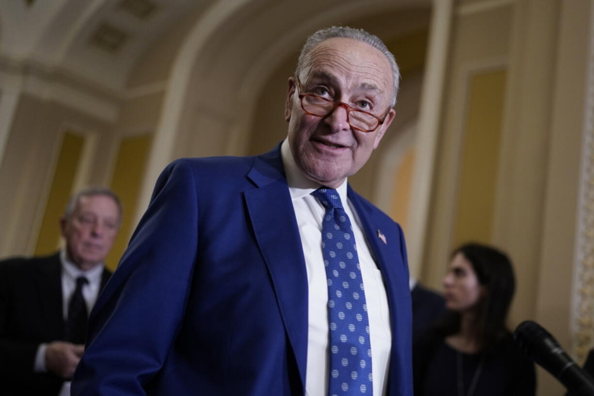 FILE - Senate Majority Leader Chuck Schumer, D-N.Y., speaks to reporters at the Capitol in Washington, Nov. 15, 2022. Democrats celebrating a successful effort to keep control of the U.S. Senate this year will soon confront a 2024 campaign that could prove more challenging. (AP Photo/J.
