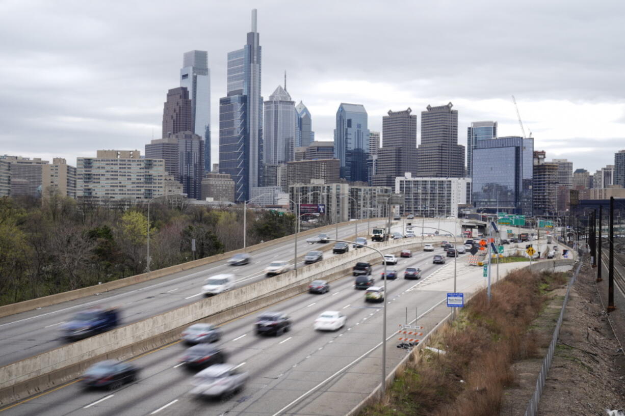 FILE - Traffic moves along the Interstate 76 highway on March 31, 2021, in Philadelphia. Two new U.S. studies released Tuesday, Nov. 15, 2022, show that automatic emergency braking can cut the number of rear-end automobile crashes in half, and reduce pickup truck crashes by more than 40%.