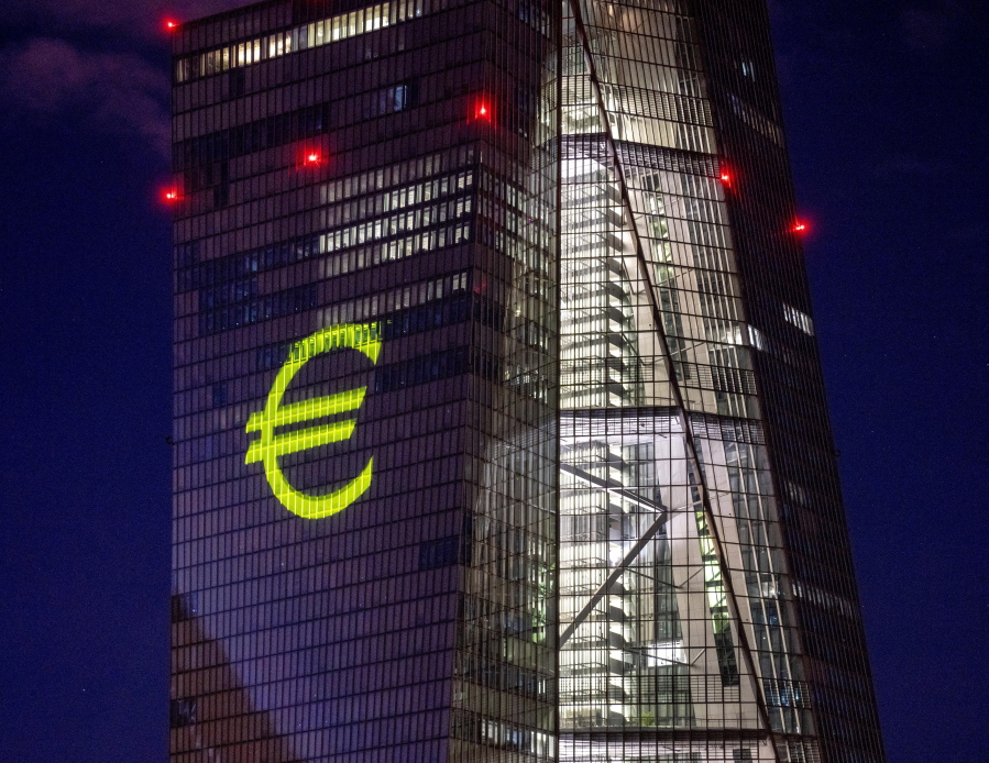FILE - A light installation is projected onto the building of the European Central Bank during a rehearsal in Frankfurt, Germany, Dec. 30, 2021. Inflation hit a new record in the 19 countries that use the euro currency, fueled by out-of-control prices for natural gas and electricity due to the war in Ukraine, the European Union statistics agency Eurostat reported Monday, Oct. 31, 2022.