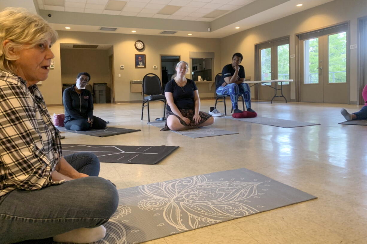 Participants in a six-week mindfulness course put on by East St. Tammany Habitat for Humanity and the Northshore Community Foundation gather in Slidell, La.