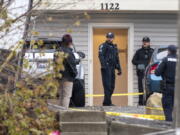 Officers investigate a homicide at an apartment complex south of the University of Idaho campus on Sunday, Nov. 13, 2022. Four people were found dead on King Road near the campus, according to a city of Moscow news release issued Sunday afternoon.