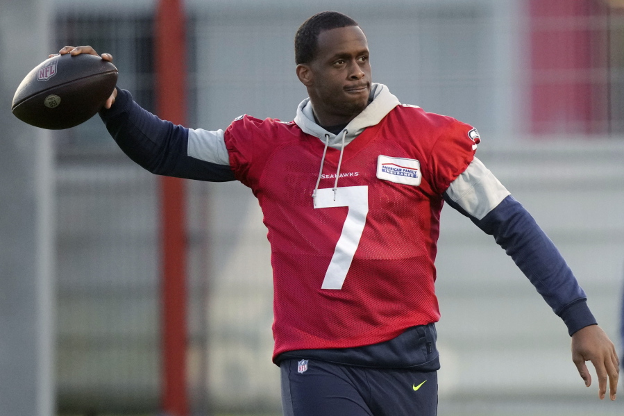 Seattle Seahawks quarterback Geno Smith throws a ball during a practice session in Munich, Germany, Thursday, Nov. 10, 2022. The Tampa Bay Buccaneers are set to play the Seattle Seahawks in a NFL game at the Allianz Arena in Munich on Sunday.