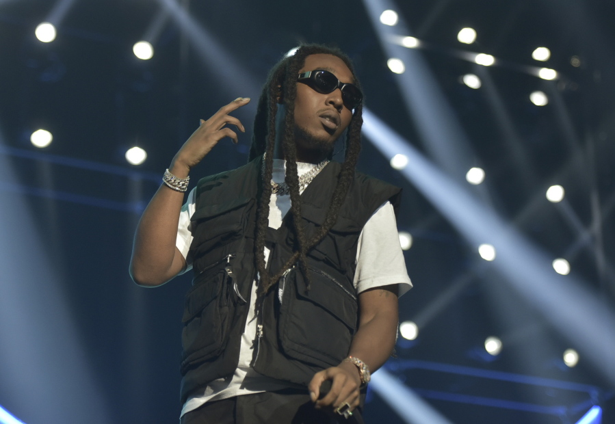 FILE - Takeoff of the group Migos performs during the 2019 BET Experience in Los Angeles on  June 22, 2019. A representative confirms that rapper Takeoff is dead after a shooting outside of a Houston bowling alley. Takeoff , whose real name was Kirsnick Khari Ball, was part of Migos along with Quavo and Offset. He was 28.
