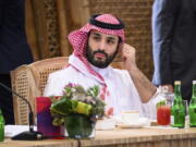 Crown Prince Mohammed bin Salman of Saudi Arabia takes his seat ahead of a working lunch at the G20 Summit, Tuesday, Nov. 15, 2022, in Nusa Dua, Bali, Indonesia.