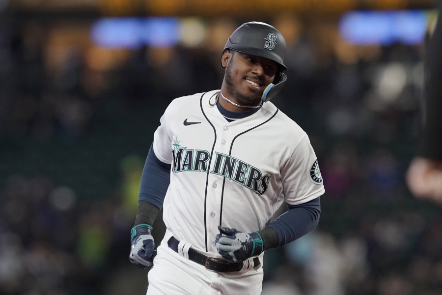 Seattle Mariners' Kyle Lewis has been traded to the Arizona Diamondbacks for catcher/outfielder Cooper Hummel, according to a person with direct knowledge of the deal on Thursday, Nov. 17, 2022. (AP Photo/Ted S.