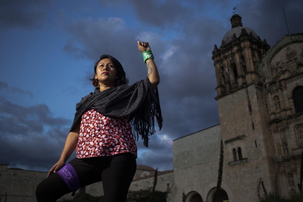 Abortion-rights activist Viridiana Bautista of the organization Las Consejeras, poses for a portrait in Oaxaca, Mexico, Wednesday, Oct. 12, 2022. Bautista, 36, had an abortion almost 13 years ago that led to serious medical complications. Due to her religious upbringing, Bautista said she initially felt guilty about her decision, but overcame that as she became engaged in abortion-rights activism.