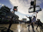 Gonzaga forward Drew Timme (2) shoots against Michigan State forward Jaxon Kohler (0) during the first half of the Carrier Classic NCAA college basketball game aboard the USS Abraham Lincoln in Coronado, Calif. Friday, Nov. 11, 2022.